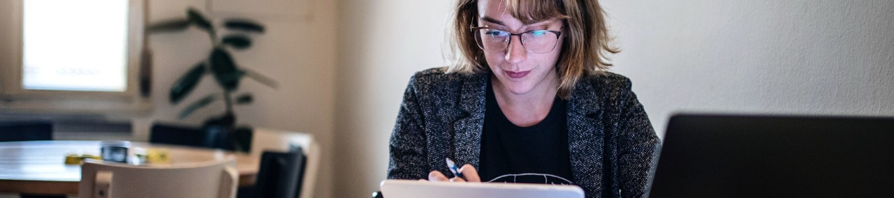 User on laptop at home