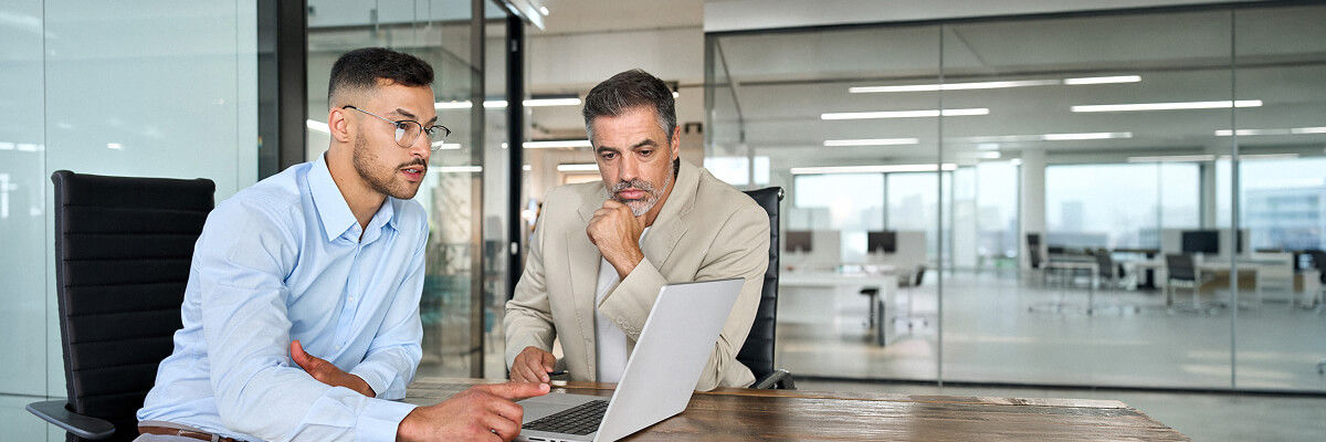 Man on laptop working.