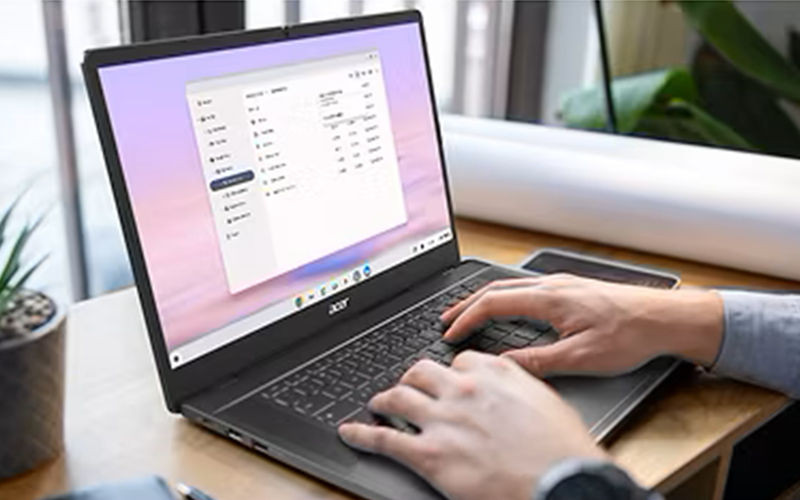 Man using Acer laptop