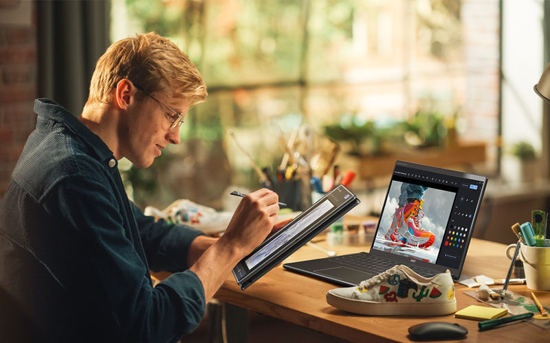 Man using Acer laptop