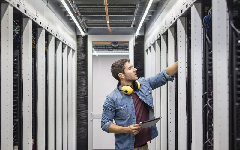 Man working in server room