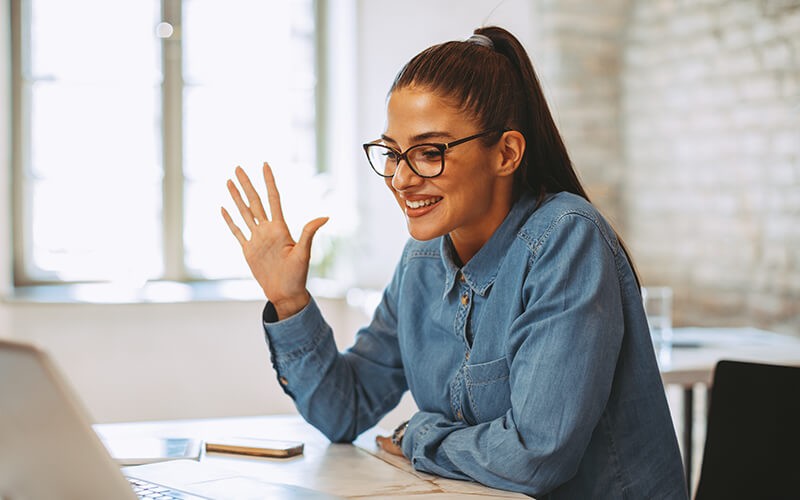 Woma having a video conference