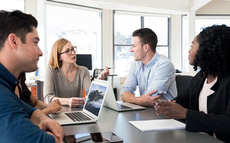 Business team discusses multiple data migration methods to client