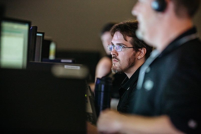 Helpful group of remote technical assistants 