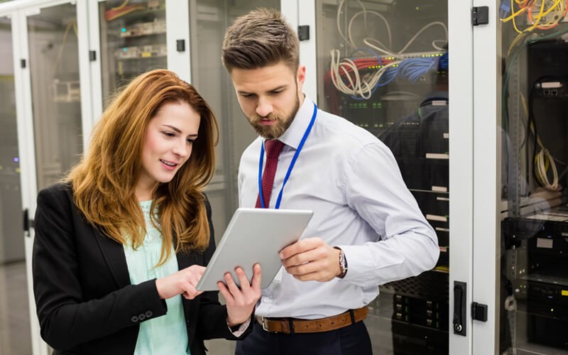 IT network administrators work in data center working with hyperconverged solutions