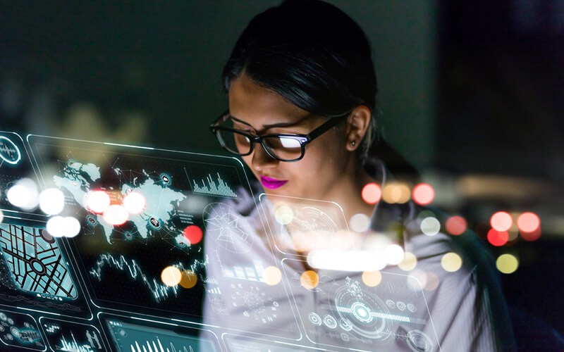 businesswoman-with-abstract-data-computer-overlay